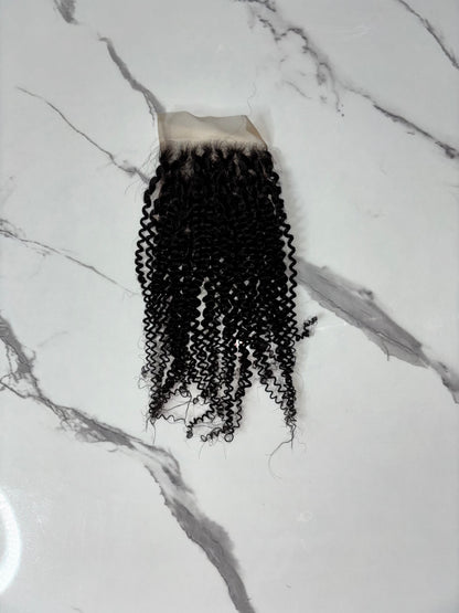 Kinky Curl Closures